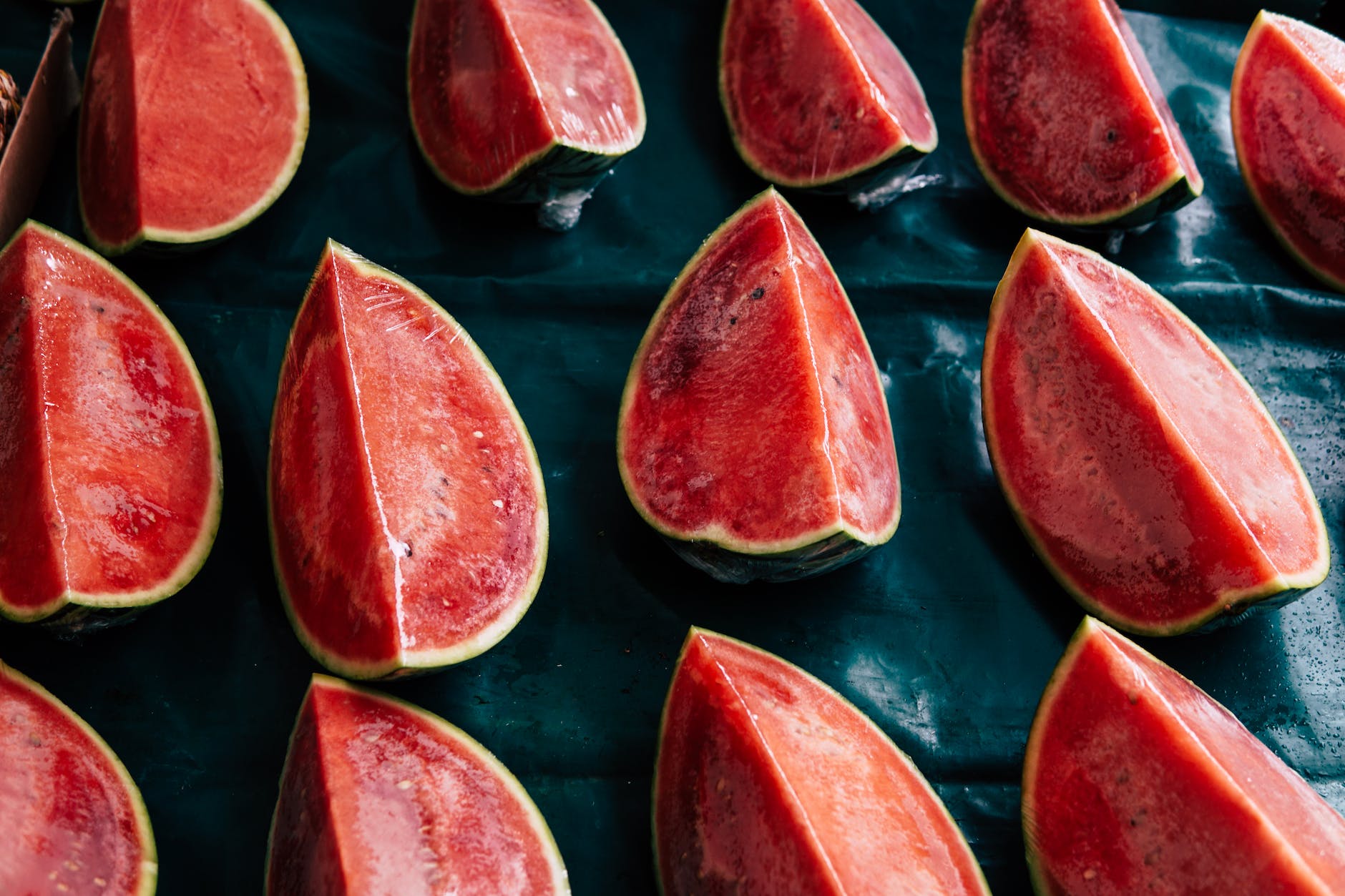 flat lay photography of slices of red watermelon